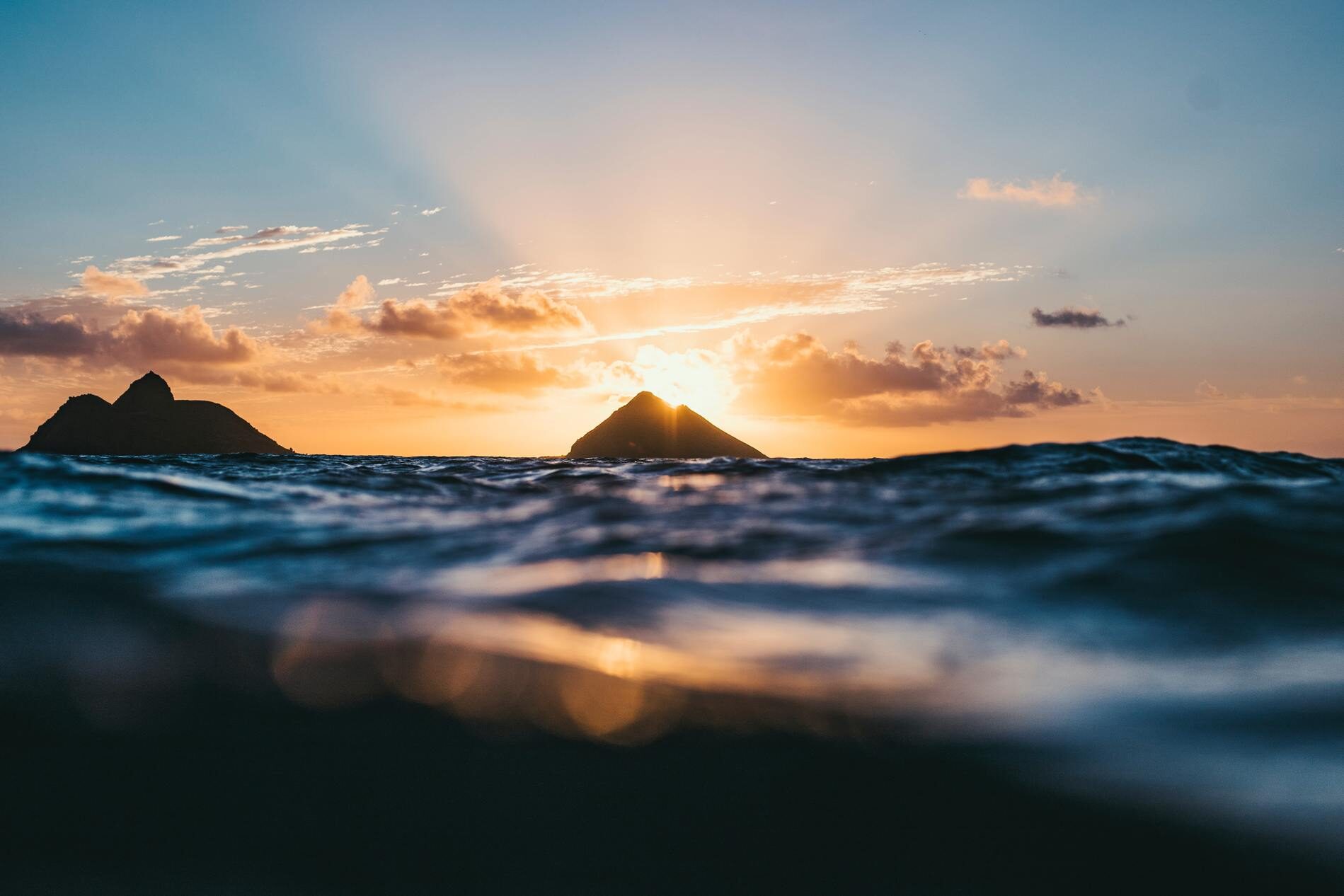 Sunrise over the water on the Windward coast